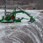Watermaster to assist with icebreaking above the Vischer Ferry hydroelectric dam on the Mohawk River.
