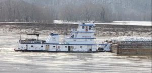 Capt. Kirby Dupuis transits down the Ohio River near Stout, Ohio, in 2019.