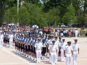 Midshipmen and plebe candidates stand in formation at the U.S. Merchant Marine Academy at Kings Point in 2018. A recent report identified numerous challenges at the academy.