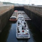 The towboat Cumberland Hunter moves through Kentucky Lock in 2017. The lock structure on the Tennessee River will receive $465 million for upgrades.