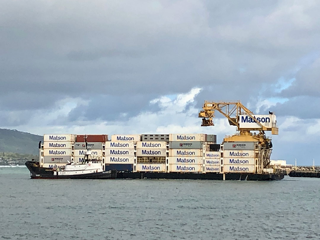MarAd designated the waters in and around Hawaii as a marine highway in 2018. Left, a container barge from Honolulu arrives in Maui.