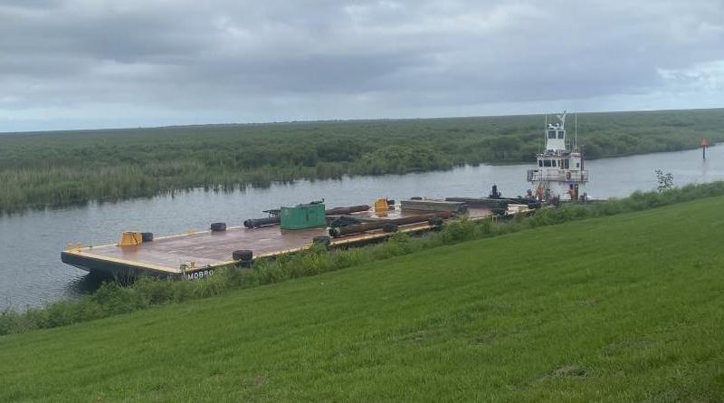 Towboat grounds in Okeechobee Waterway, breaches hull