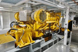 Caterpillar mains and John Deere gensets take center stage in Charles Hughes’ engine room.