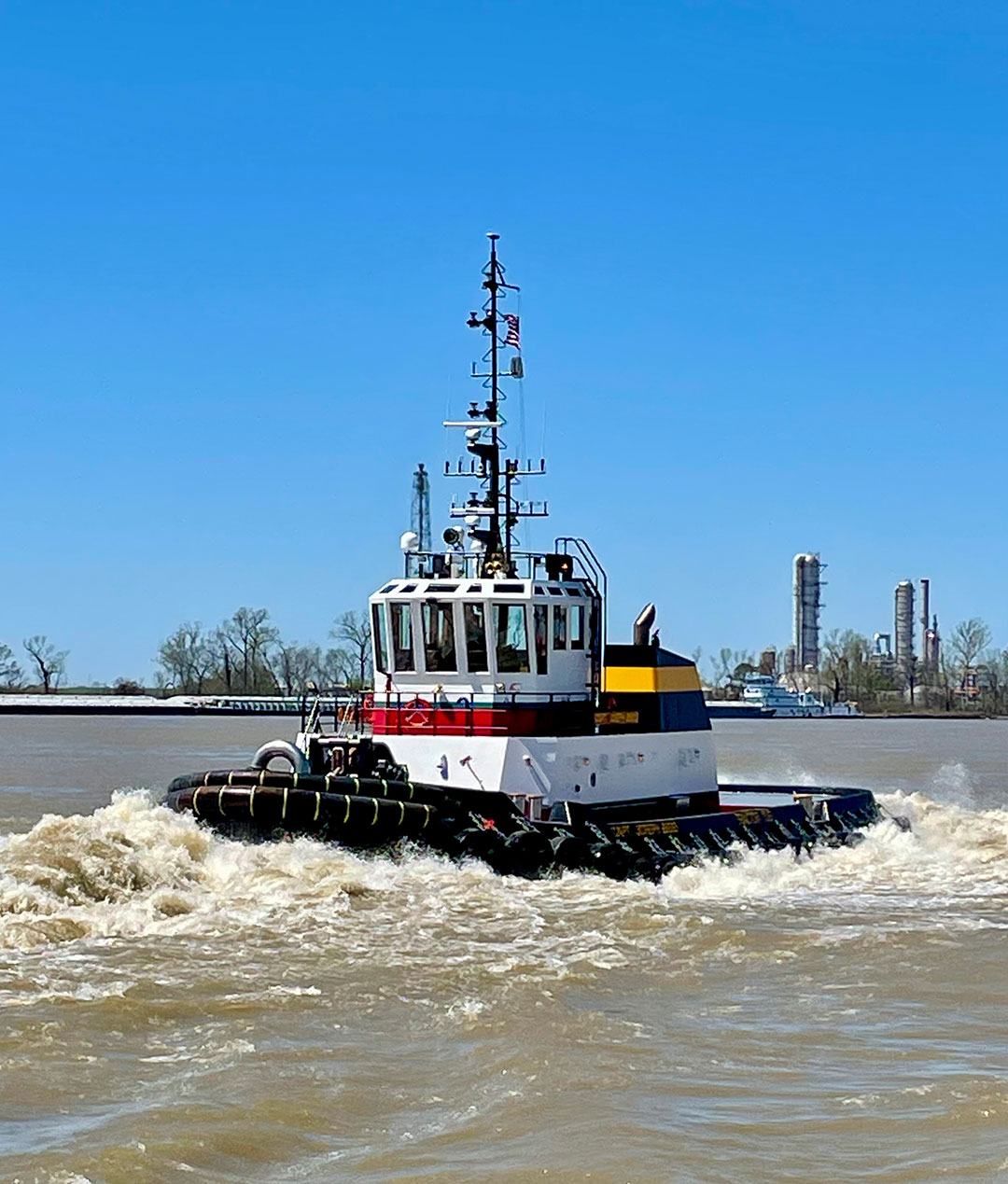 Capt. Joseph Bisso powers down the Lower Mississippi River during spring high water.