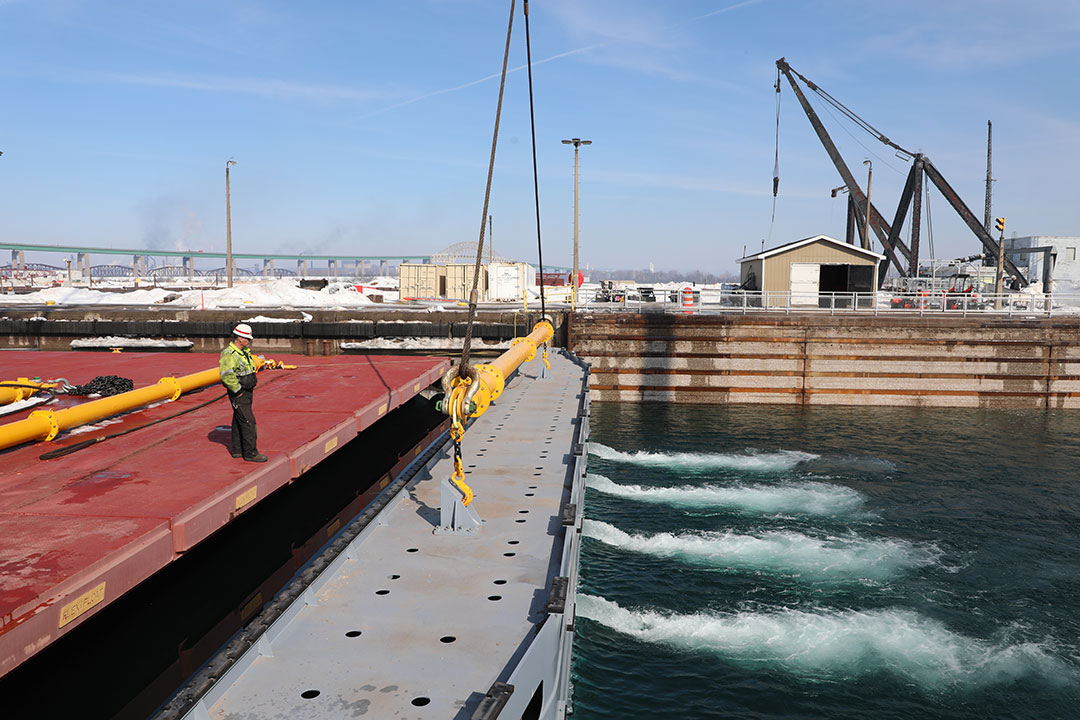 Jim Young of the U.S. Army Corps of Engineers prepares to open Poe Lock, within the Soo Locks facility, earlier this year.