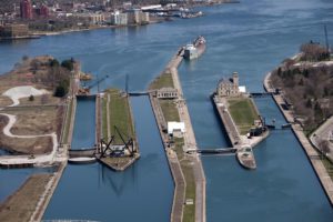 The two active lock chambers are the Poe Lock and MacArthur Lock, situated at right in the image.