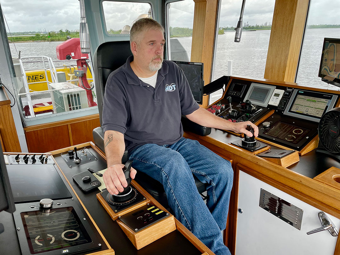 Capt. Dion Kingsbury steers Ralph toward a waiting bulker in Lake Charles.