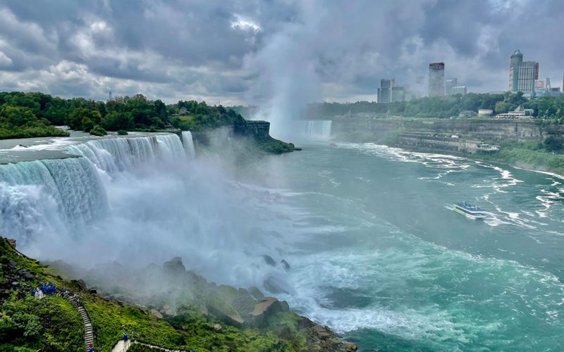 James V. Glynn, above, passes Bridal Veil Falls and the larger American Falls on its way back to the dock. The iconic Horseshoe Falls is upriver