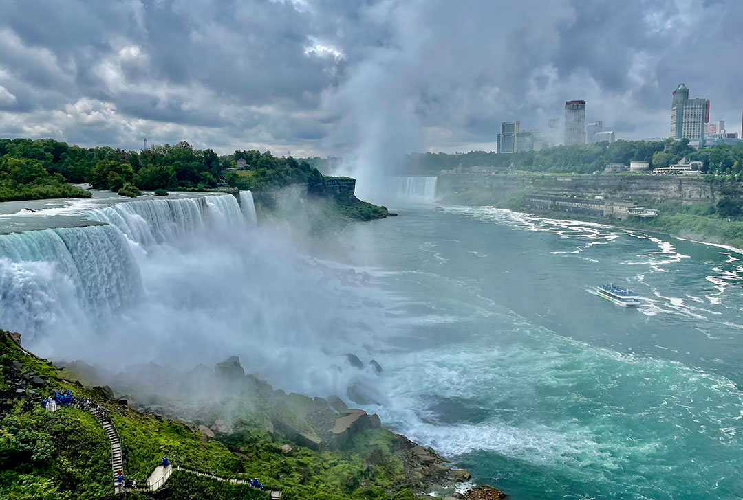 James V. Glynn, above, passes Bridal Veil Falls and the larger American Falls on its way back to the dock. The iconic Horseshoe Falls is upriver