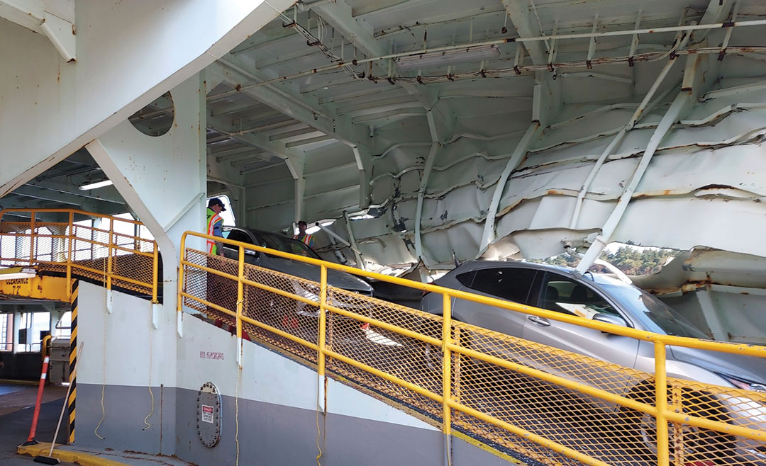 At least two vehicles inside the ferry also were damaged.