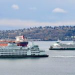 Washington State Ferries’ Jumbo Mark II-class ferry Puyallup, right, and Olympic-class ferry Chimacum, meet in Elliott Bay in 2020.