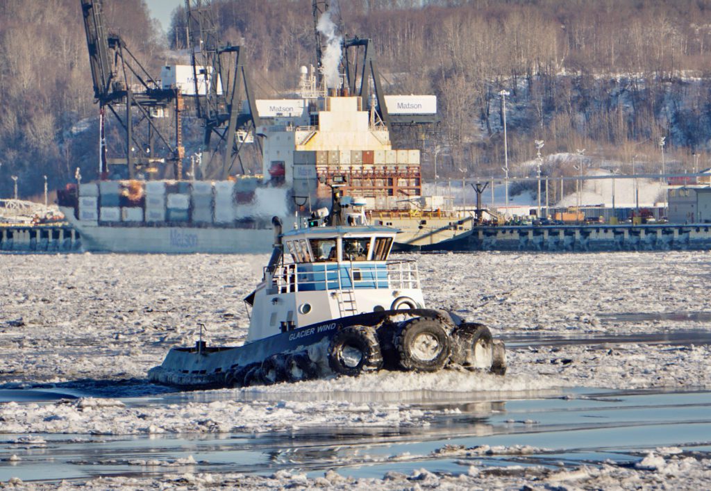 Tractor tires on Cook Inlet Tug & Barge’s Glacier Wind provide cushion and grip in icy conditions.