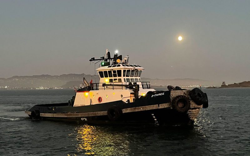 The AmNav tugboat Z-Three gets underway from a Richmond, Calif., dock as dusk settles on San Francisco Bay.