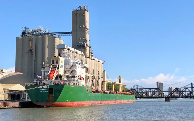 The Cyprus-flagged bulker Maccoa prepares to get underway from a Toledo, Ohio, grain terminal. Foreign ships must carry pilots when transiting the Great Lakes and St. Lawrence Seaway.