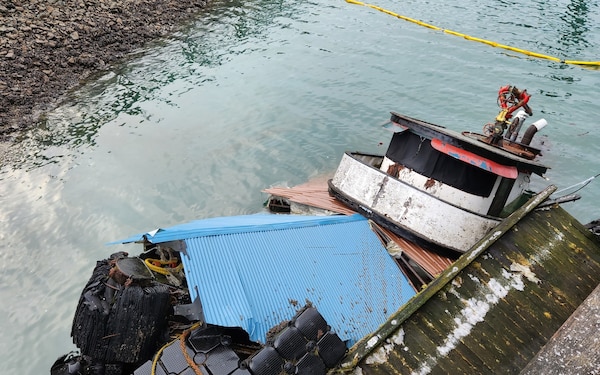 Responders to raise partially submerged tug at Alaska dock