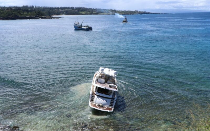 Grounded yacht pulled from Maui rocks after two weeks