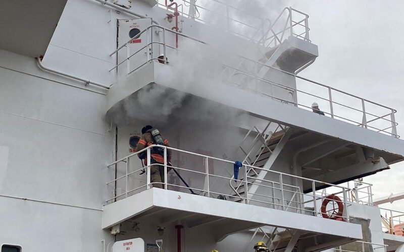 The fire was confined to the bulk carrier’s laundry room. 