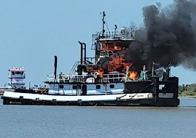 Cracked exhaust muffler cited in fire that destroyed towboat