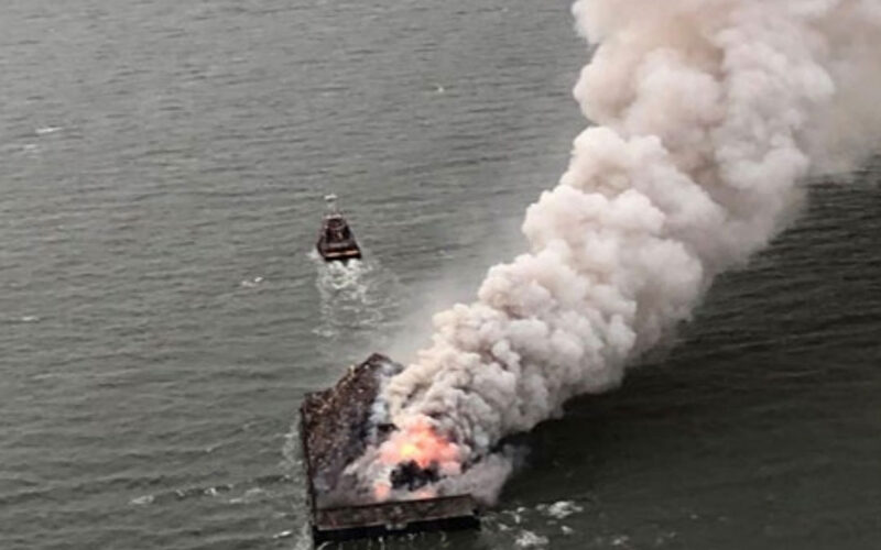 Lithium-ion batteries eyed in fire aboard scrap metal barge