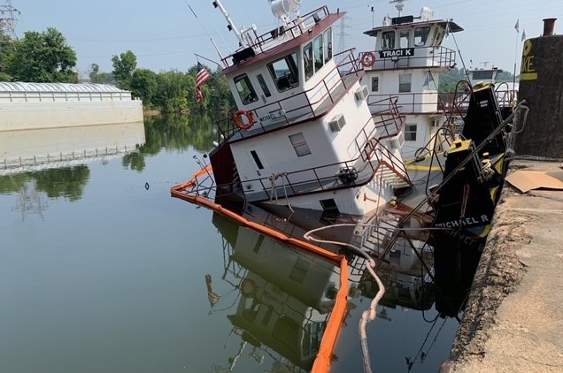 Partially sunken towboat spills fuel into Tennessee River