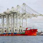Four Chinese-made containers cranes arrive at the Port of Seattle for unloading at the port’s SSA container terminal.