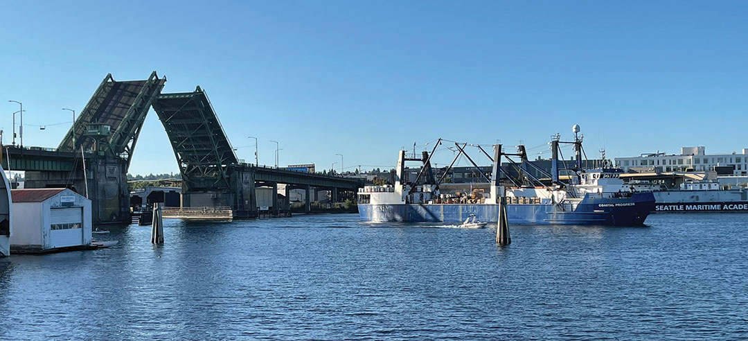 The Ballard Bridge closes behind Coastal Progress after the ship passed under the span.