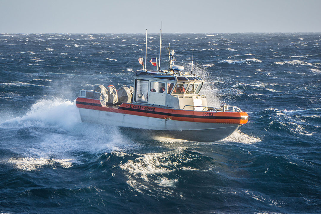 A 35-foot Coast Guard Long Range Interceptor II craft underway at speed.