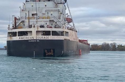 Tugboats help free grounded freighter in Michigan