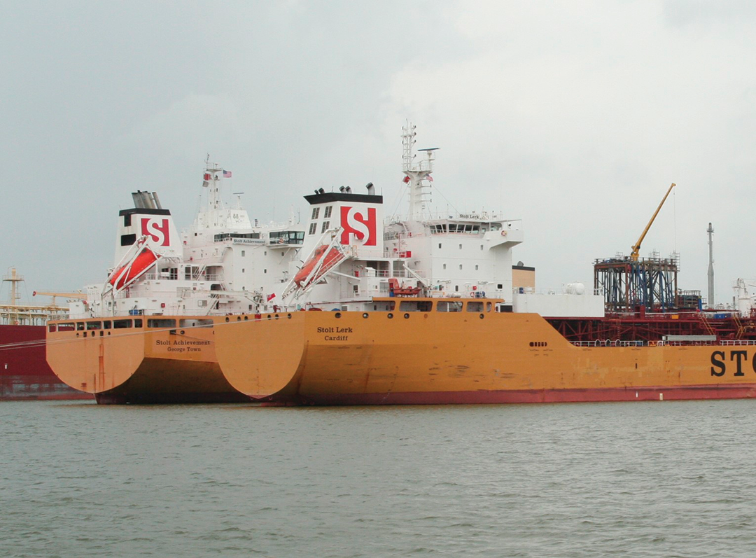 A pair of ochre-hulled Stolt product tankers awaiting cargoes at the Port of Houston.