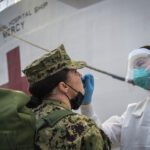 Sailors undergo Covid-19 testing outside the Military Sealift Command (MSC) hospital ship USNS Mercy (T-AH 19) in November 2021.