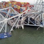 The 984-foot containership Dali, with the fallen Francis Scott Key Bridge across its forward deck on the Patapsco River, Baltimore, Md., on March 28, 2024.