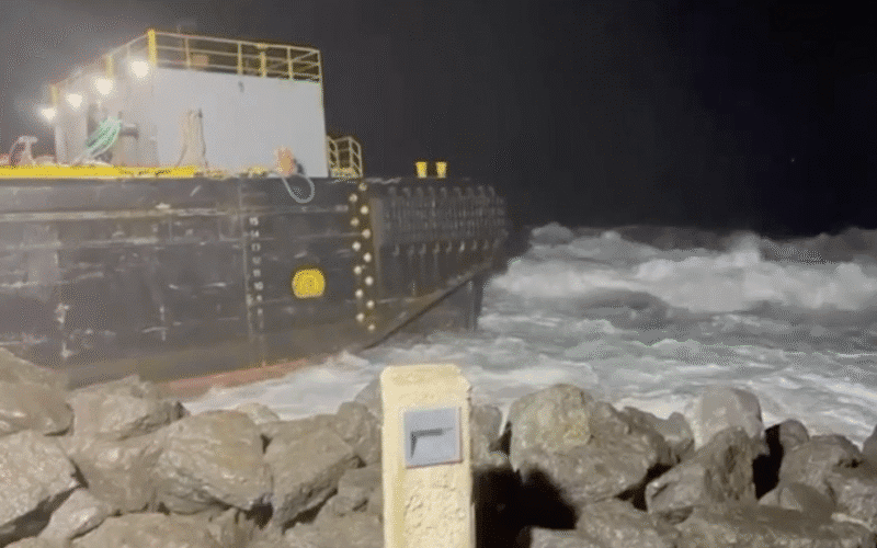 Salvors remove grounded barge from entrance to San Juan Harbor