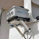 WhaleSpotter’s thermal detection unit, roughly the size of a shoebox, uses infrared imaging and AI to detect whale spouts and body heat up to 4 nautical miles ahead of a vessel. Mounted high on the vessel with a user interface modeled on a radar display, the system can be installed in under an hour without drydock, providing crews with nighttime and low-visibility whale detection along busy shipping routes.