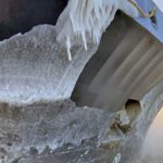 Ice accumulates on a ship’s bow, adding weight high on the vessel and reducing stability.