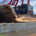 An April 2024 photo of barge PTC 706 at a recycling yard in Houma, La., after spending 24 days on the bottom of the Mississippi River.