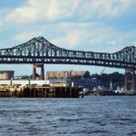 The Tobin Memorial Bridge, seen in 2009, spans the Mystic River in Boston Harbor. A newly installed NOAA Physical Oceanographic Real-Time System (PORTS) includes an air gap sensor on the bridge to provide mariners with real-time vertical clearance data as tides shift throughout the day.