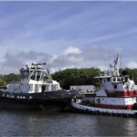 Saturn (left), the first in a new H500 series of RApport 3000 escort tugs built by Master Boat Builders for Suderman & Young, brings more than 90 metric tons of bollard pull and 7,000 hp to a new class of high-performance Gulf Coast ship-assist vessels.