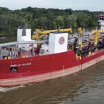 The 346-by-69-by-23-foot Amelia Island is GLDD’s newest trailing suction hopper dredge. The 16,500-hp vessel has a 6,330-cubic-yard hopper and two 800-millimeter trailing suction pipes capable of dredging to depths of 100 feet.