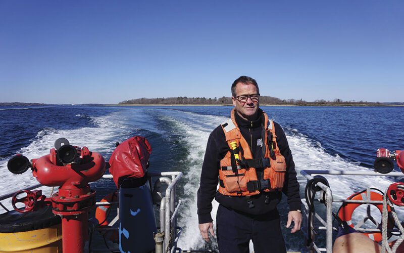 Capt. Christopher Alves poses for a portrait in Diamond Pass near Peaks Island, Maine.