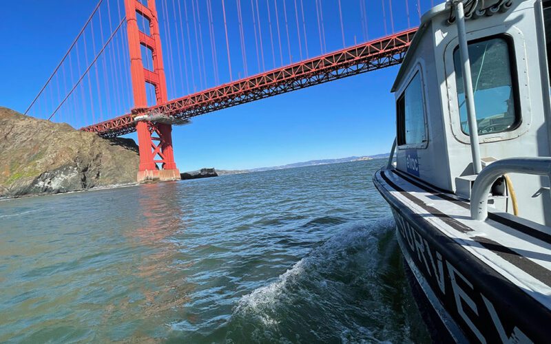 A Woolpert Maritime survey vessel works near the Golden Gate Bridge. The company operates a fleet of roughly 25 survey vessels from locations across the United States, mapping environments ranging from ports and rivers to coastal and offshore waters.